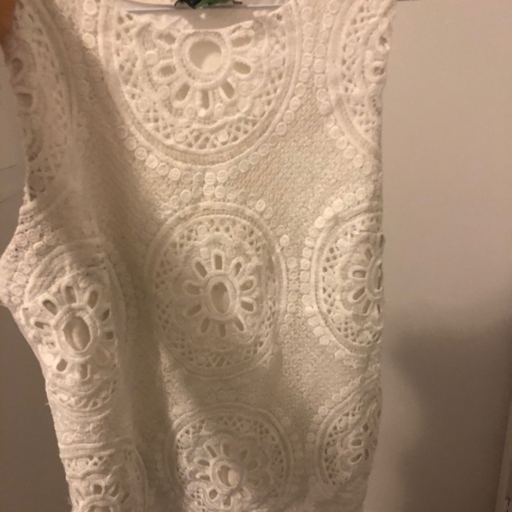 Sleeveless white classy top